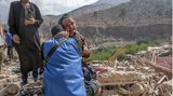Marokko. Eine Frau trauert nach dem großen Erdbeben um ihre verlorenen Familienangehörigen.