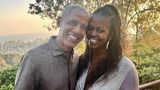 Barack und Michelle Obama lächeln
