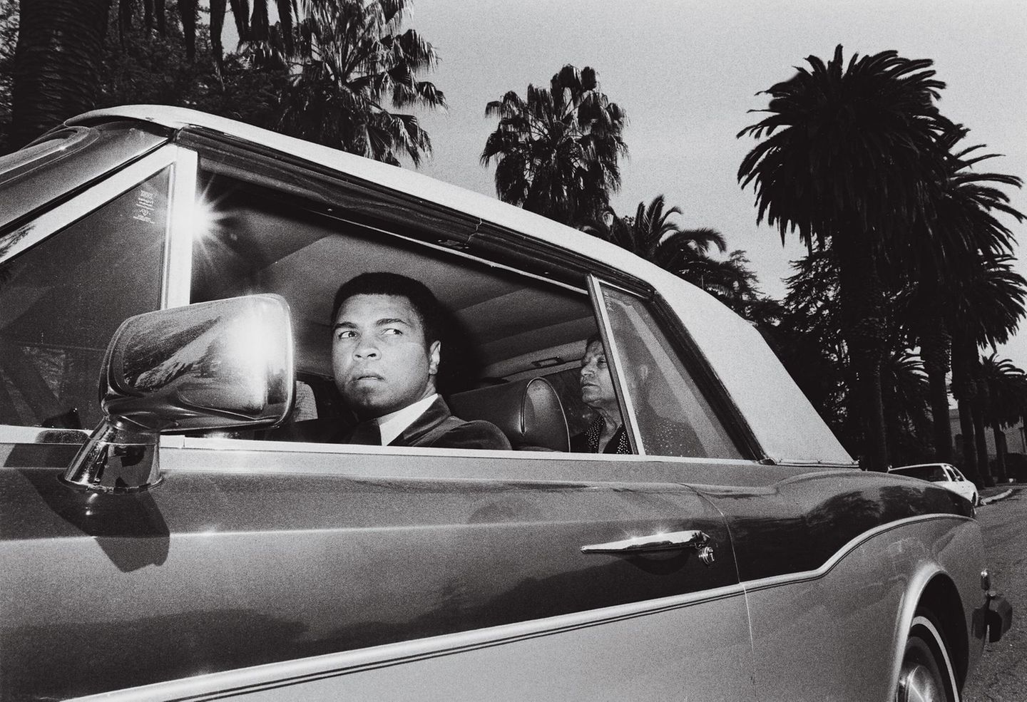 Volker Hinz, 1984: Muhammad Ali im Rolls-Royce, auf dem Rücksitz sein Butler  Hier abstimmen: www.stern.de/voting75