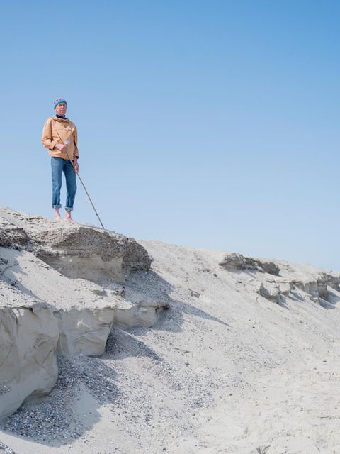Uwe Garrels, Nationalparkführer und ehemaliger Bürgermeister von Langeoog, steht auf einer Düne