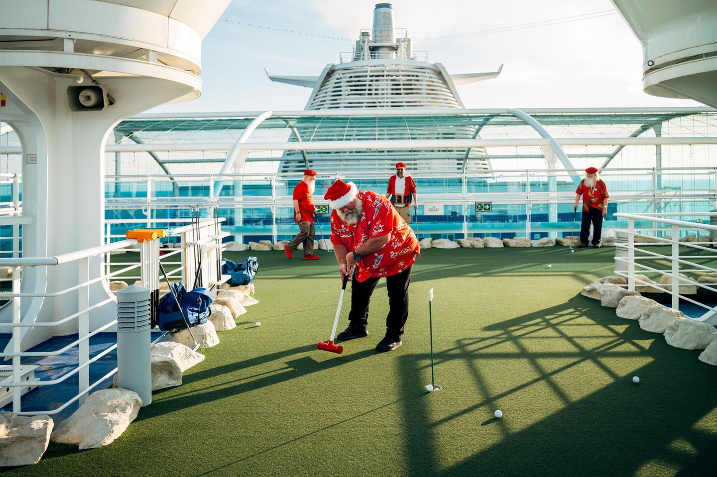 Santas spielen Golf Santas spielen Golf
