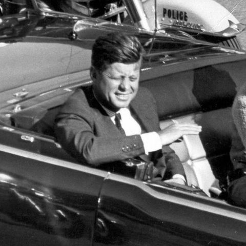 John F. Kennedy and Jacqueline Kennedy shortly before the assassination attempt