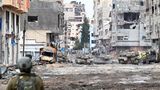 Demolierte Gebäude, ausgebrannte Fahrzeuge: Israelische Panzer und Soldaten in einer Straße im Norden des Gazastreifens
