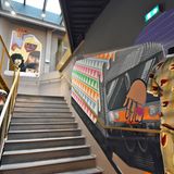 Die Wände der Freitreppe zum ersten Stockwerk zieren großformatige Wandbilder im Graffiti-Stil.