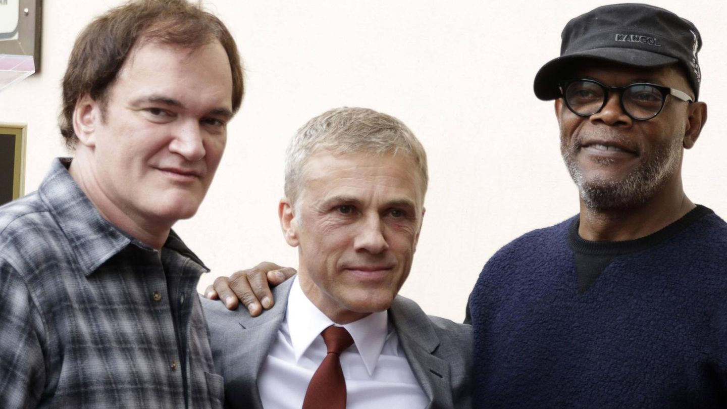Samuel L. Jackson mit Schauspielkollege Christoph Waltz (M.) und Regisseur Quentin Tarantino