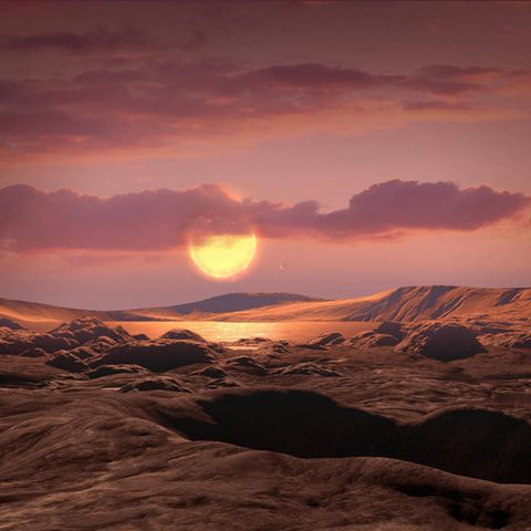 Künstlerische Darstellung einer Planetenoberfläche mit rötlichen Felsen