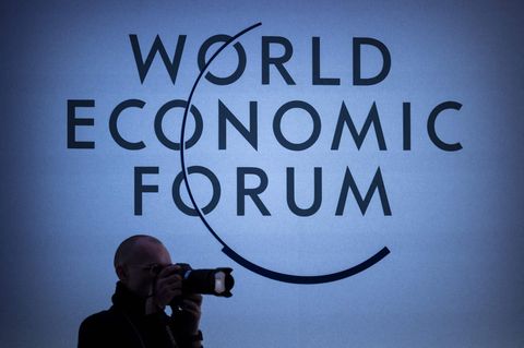Ein Fotograf beim Weltwirtschaftsforum in Davos