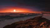 Blick auf die Oberfläche des Planeten Proxima b, der den roten Zwergstern Proxima Centauri umkreist