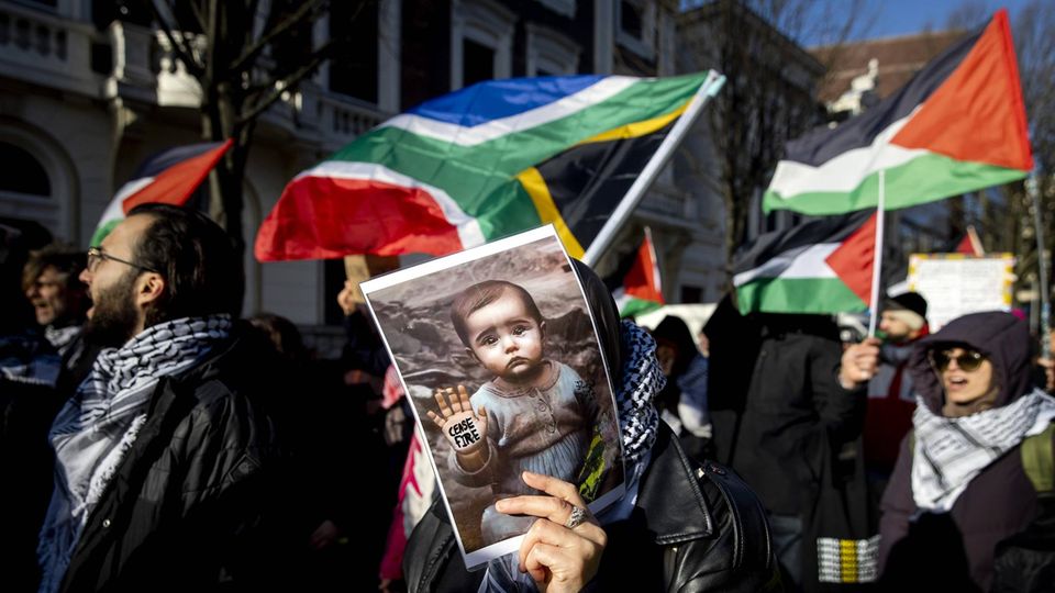 Demonstrators show solidarity with the Palestinian population and support the South African lawsuit at the International Court of Justice in The Hague