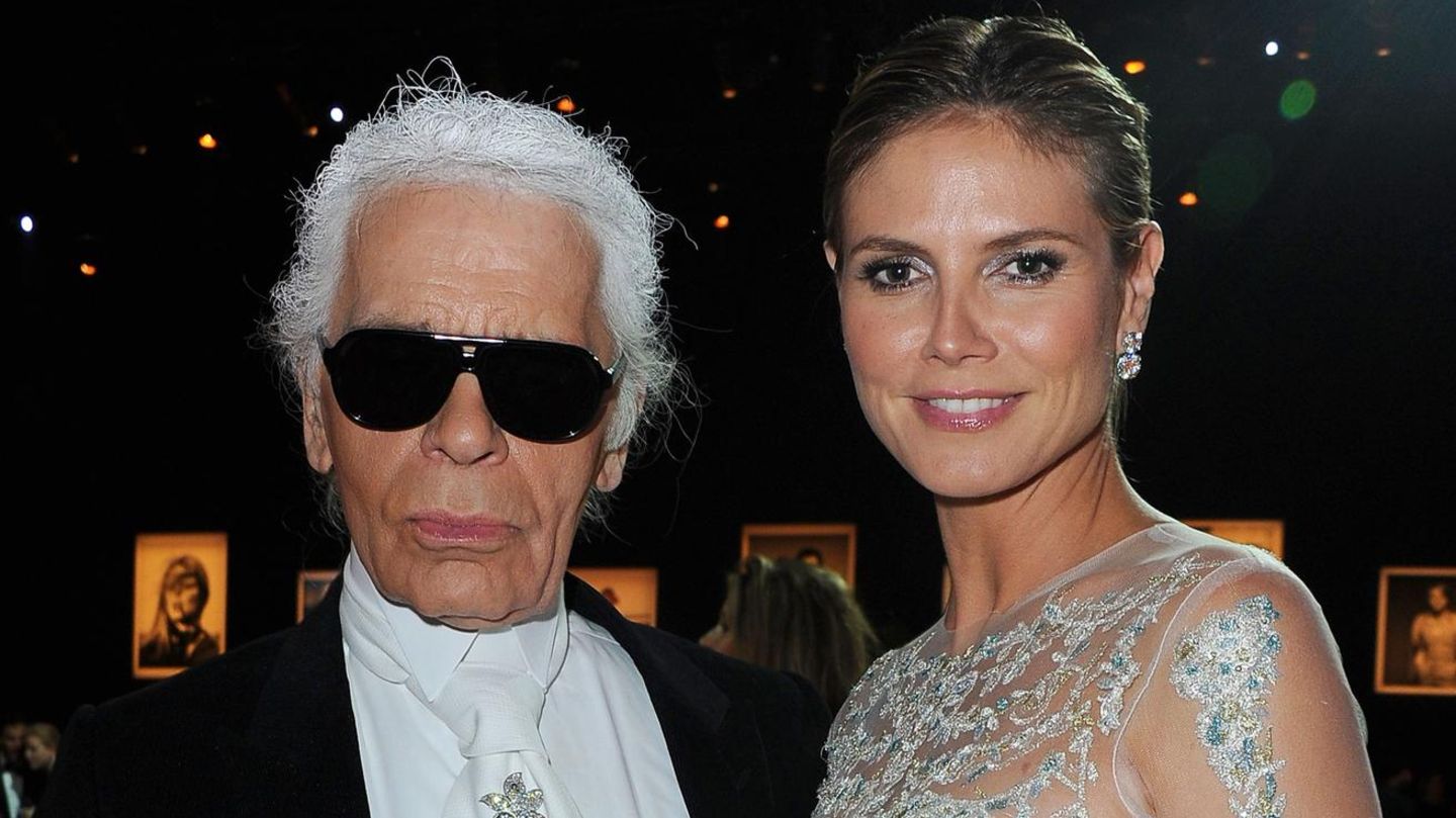 Karl Lagerfeld (links) neben Heidi Klum