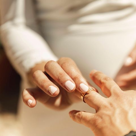 A few exchanges rings as a symbolic photo for date with a manedeed man