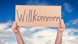 Foto Schild mit der Beschriftung "Willkommen"
