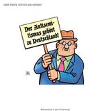 Karikatur eines Demonstranten, der meint, dass Antisemitismus zu Deutschland gehöre