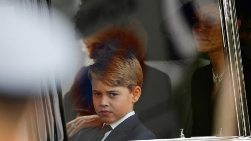 Prince George with his mother Kate at his grandmother's funeral Prince George with his mother Kate at his grandmother's funeral