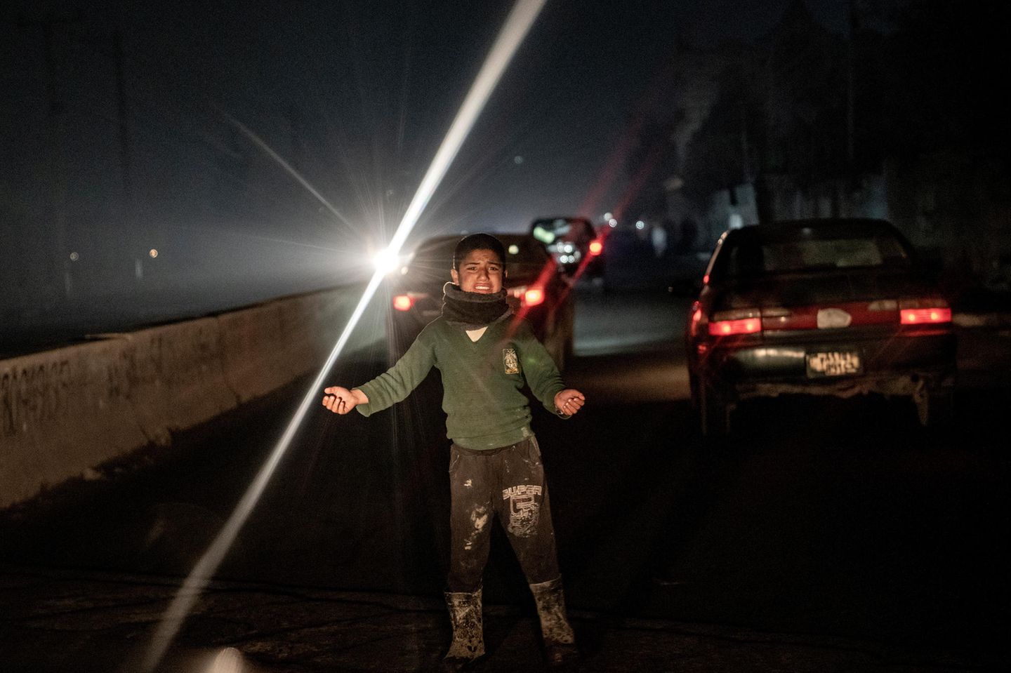 World Press Photo: Ein afghanischer Junge bettelnd in Kabul
