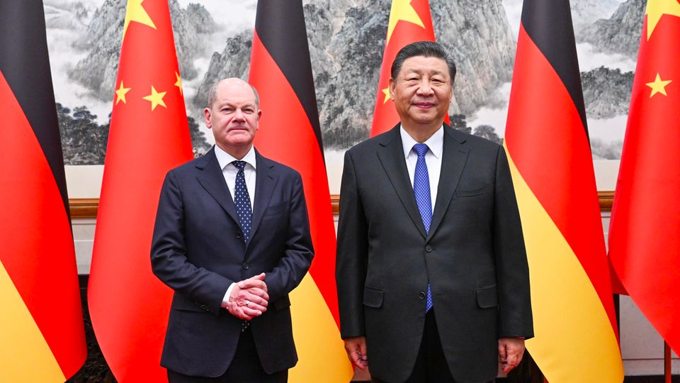 Bundeskanzler Olaf Scholz (l.) und Chinas Staatschef Xi Jinping