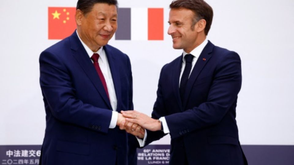Xi und Macron nach einem gemeinsamen Pressestatement