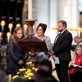 An dem Gottesdienst nahmen auch Veteraninnen und Veteranen Teil Michelle Turner (Mitte), die zusammen mit Tochter Maya und Ehemann John Turner anlässlich des zehnjährigen Jubiläums der Invictus Games etwas vorträgt. Prinz Harry, der Gründer der Spiele, war selbst als Soldat in Afghanistan im Einsatz