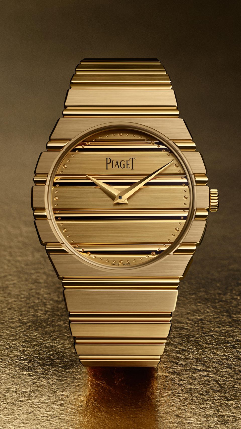 A gold watch on a gold background A gold watch on a gold background