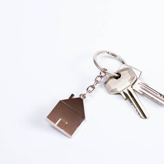 Immobilie: Schlüssel mit Hausanhänger