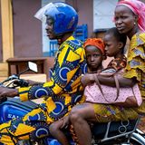 Familie auf einem Roller