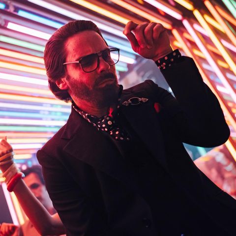 Daniel Brühl dances as Karl Lagerfeld in the new Disney+series "Becoming Karl Lagerfeld"