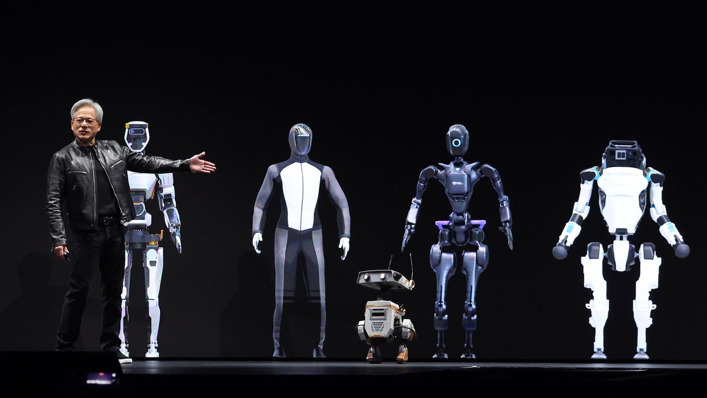 Nvidia Jensen Huang Jensen Huang mit KI-Robotern bei Nvidias jährlicher Entwicklerkonferenz