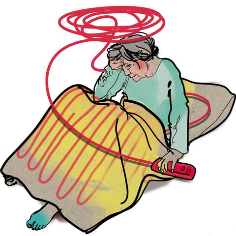 Illustration einer Frau mit Heizdecke