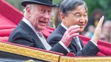König Charles, in Festtagsrobe, und Kaiser Naruhito winkten aus der Kutsche. Am Abend werden die britischen Royals zu Ehren der Gäste aus Japan ein Staatsbankett ausrichten.
