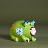 Ein Sparschwein von Hans Eichel, das sitzt