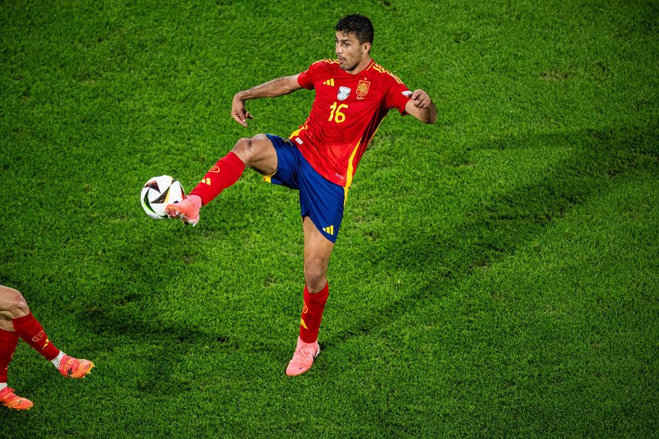 Spain's midfield director Rodri Spain's midfield director Rodri
