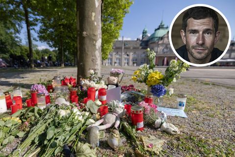 Blumen, Kerzen und handgeschriebene Trauerbekundungen erinnern im Kurpark Bad Oeynhausen an den getöteten 20-jährigen Philippos