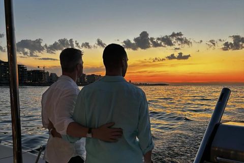 Ralf Schumacher und sein Freund auf einem Boot vor dem Sonnenuntergang