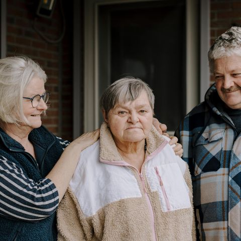 Foster resident Hilda, 65, (middle) together with her foster parents Maggy Vleugels and Jozef Huysmans in Geel. Hilda lives in an adjoining room that is attached to the house