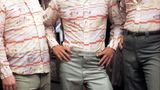 Mark Wahlberg (m.), Philip Seymour Hoffman und John C. Reilly (r.) in "Boogie Nights"