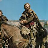 Robert Redford sitzt auf einem Pferd und schaut in die Ferne