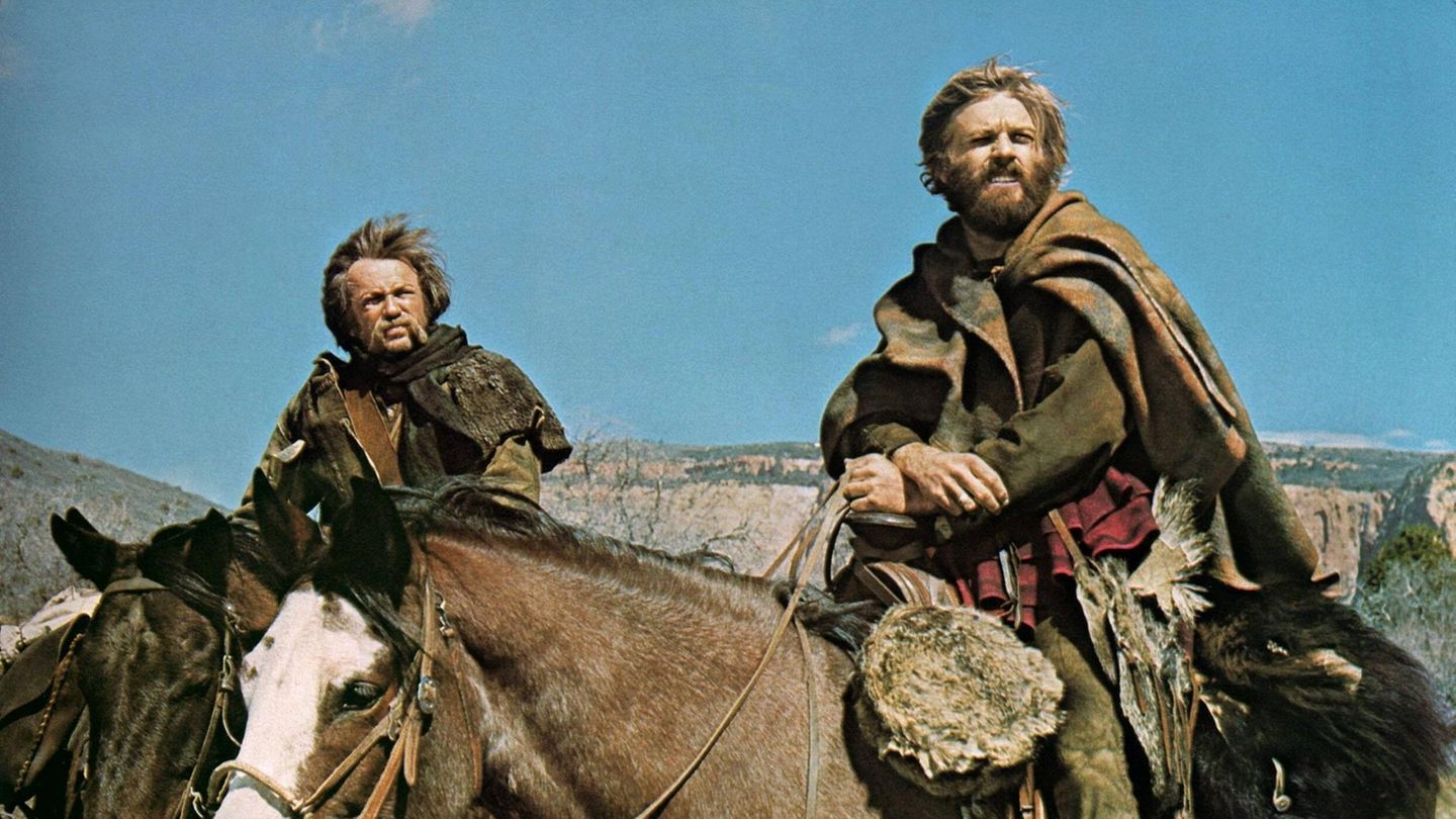 Robert Redford sitzt auf einem Pferd und schaut in die Ferne