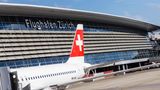 Wettbewerbsfähigkeit: ein Flugzeug im Flughafen von Zürich