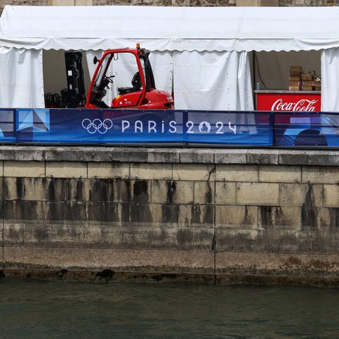 Die Seine. Wer für einen Wettkampf in die Seine muss, schwört nicht selten auf Coca Cola