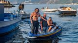 Drei Männer in einem Schiffersboot