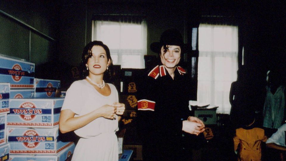 Michael Jackson and Lisa Marie Presley visiting a Budapest children's hospital in 1994