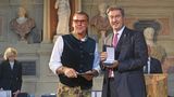 Sascha Hehn bekommt 2023 von Markus Söder den Bayerischen Verdienstorden verliehen