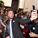 Liam Payne macht Fotos mit Fans