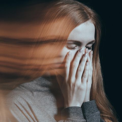 A woman with pain