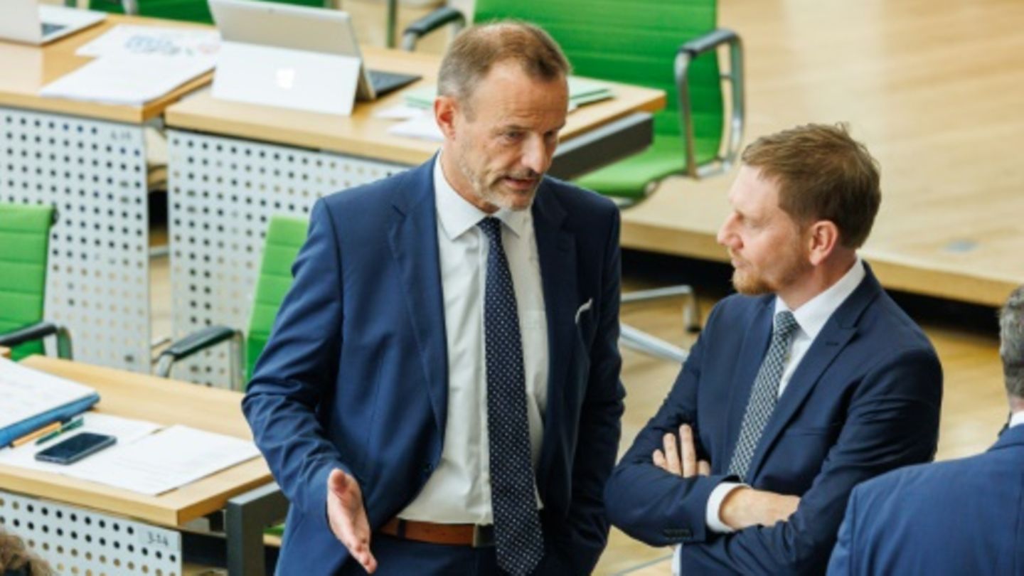 BSW-Kochef Jörg Scheibe (links) und Michael Kretschmer