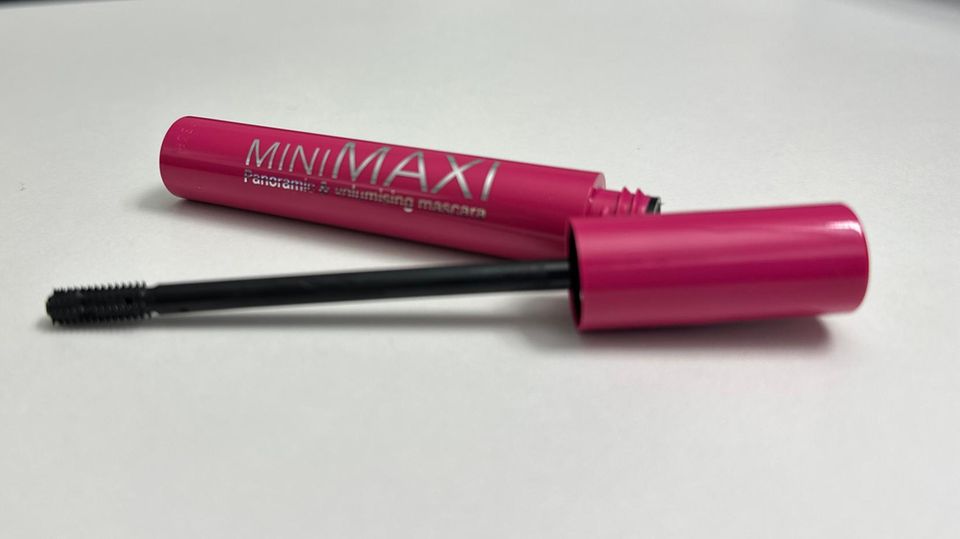 Mascara lies on a table.