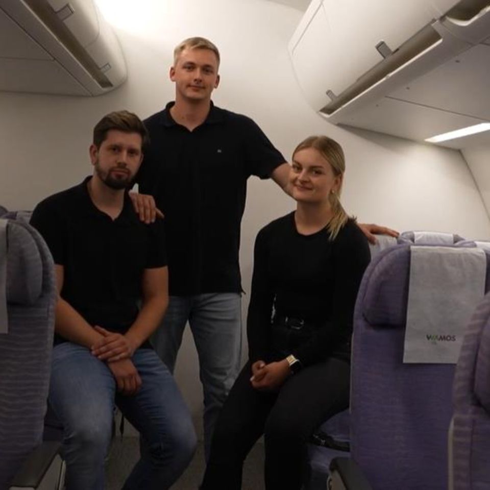 three young police officers during their further training to become air staff companions