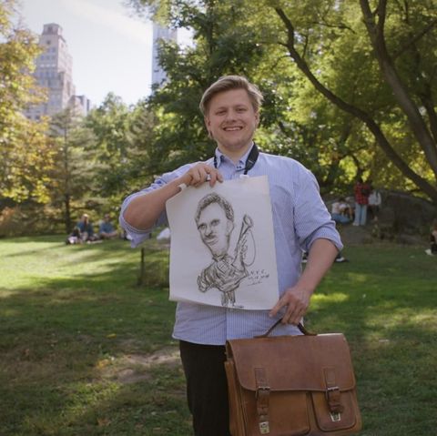 Sebastian Hotz with a cartoon