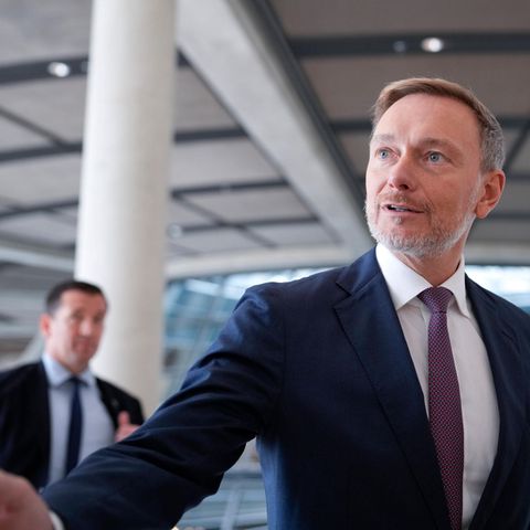 Federal Finance Minister Christian Lindner walks through the German Bundestag