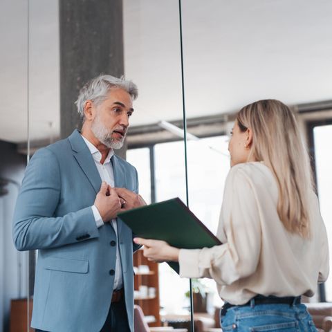 Stress in the job: Two colleagues argue in the office